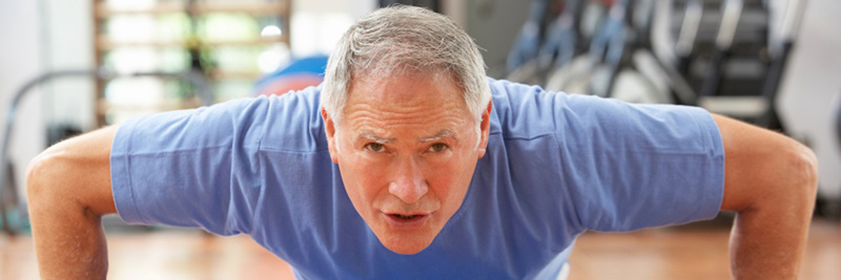 man-exercising_push-ups_oncologynews_1200x400